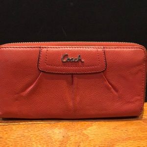 Leather zip around coach wallet in geranium